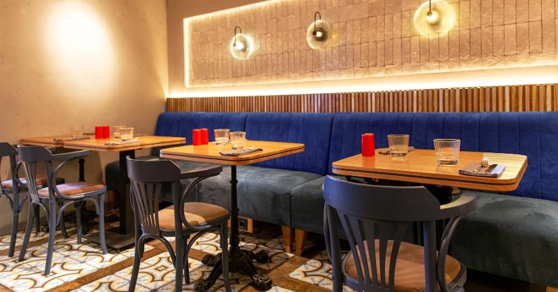 Interior of a restaurant with tables and booths